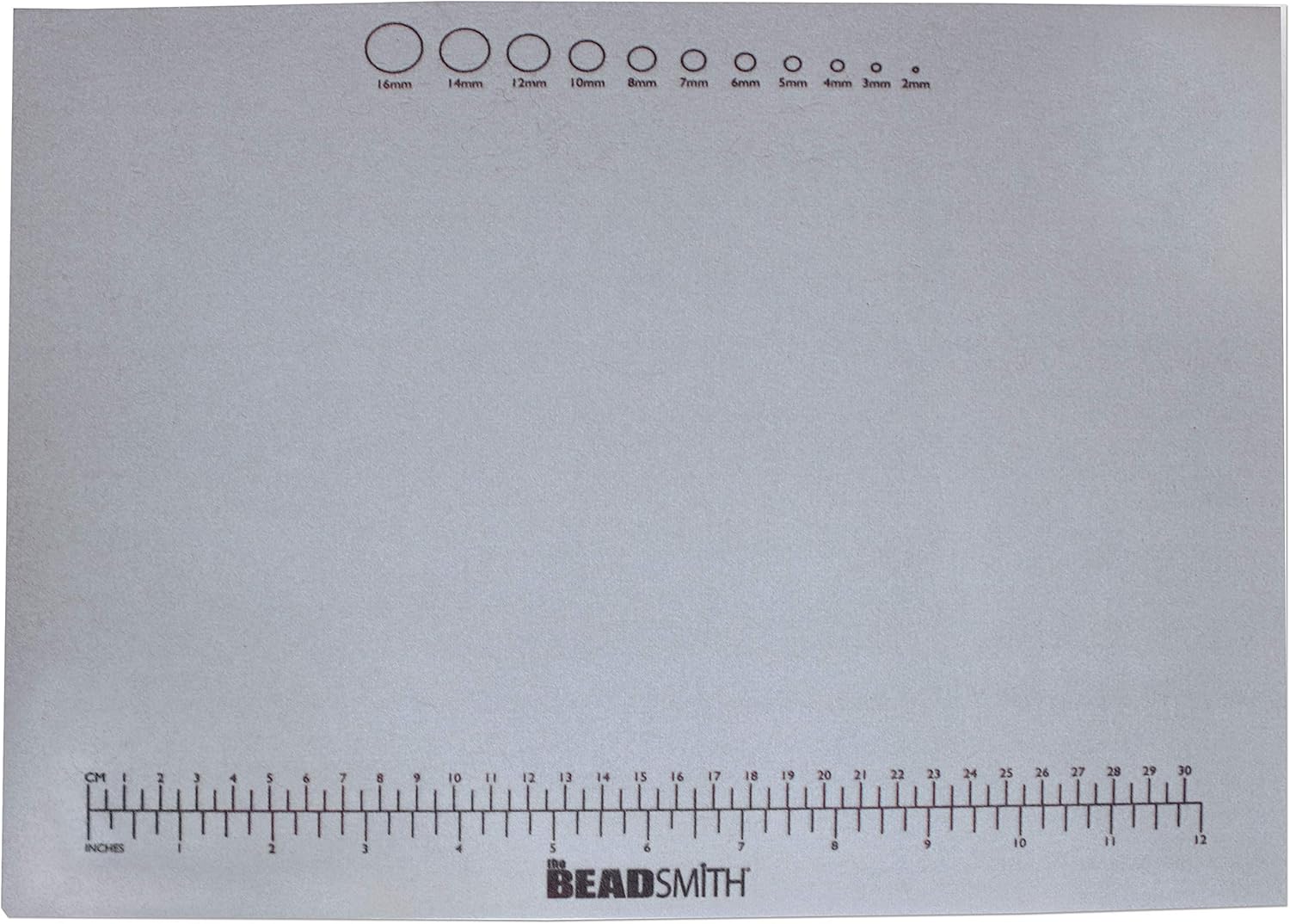 The Beadsmith Non-Slip Treasure Mat - 11 x 14 inches, Non-Slip Rubber Base with Soft Padded Surface, Laser Printed Measurements in inches and Centimeters, Clear Bag Hangable Put Up